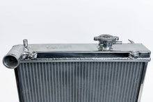 Load image into Gallery viewer, CSF 03-07 Mitsubishi Lancer EVO 7/8/9 1/2 Size Radiator - Polished - Side View
