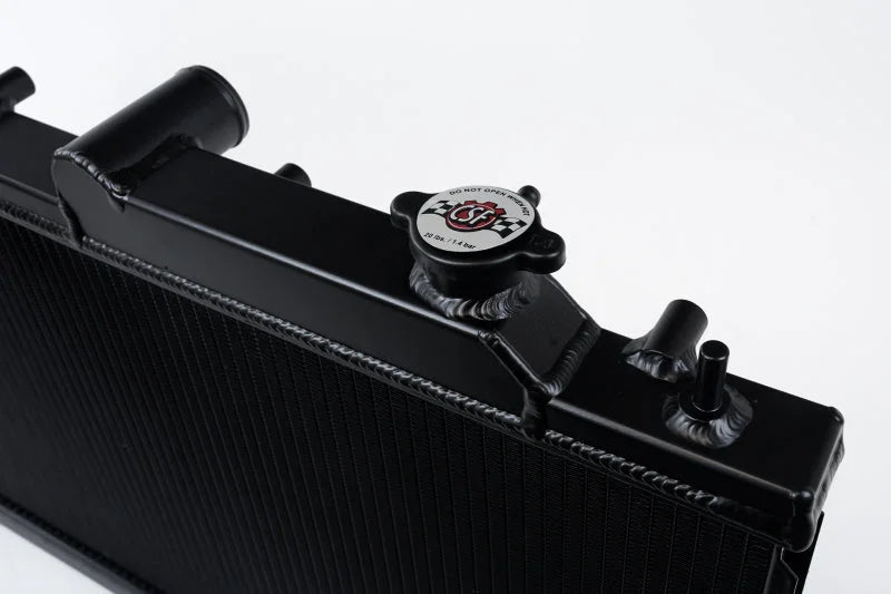 CSF 08-15 Subaru Impreza WRX/STI 1-Row 31mm High-Performance Aluminum Radiator - Black - Side View