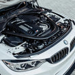 Load image into Gallery viewer, CSF 2014+ BMW M3/M4 (F8X) Top Mount Charge-Air-Cooler - Crinkle Black - Installation View
