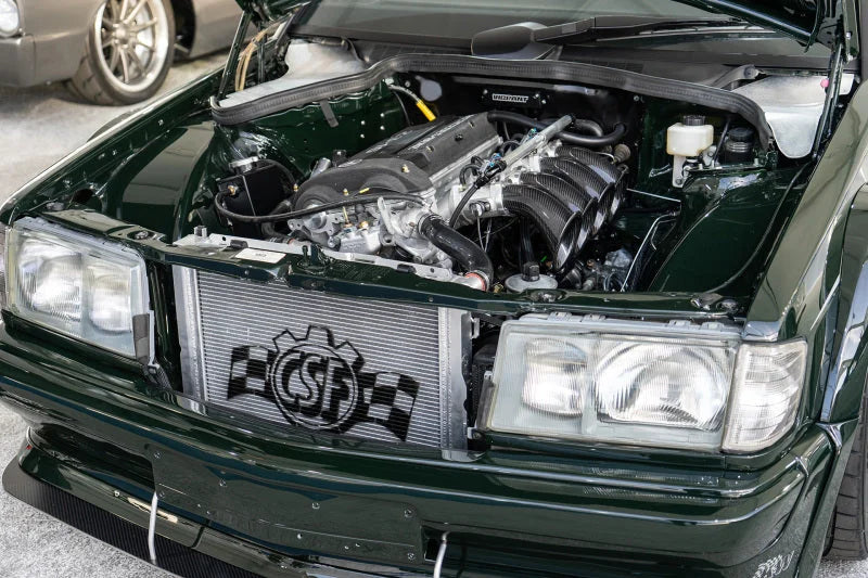 CSF 84-88 Mercedes-Benz W201 190E 2.3L - 16 w/ A/C High Performance Aluminum Radiator - Side View