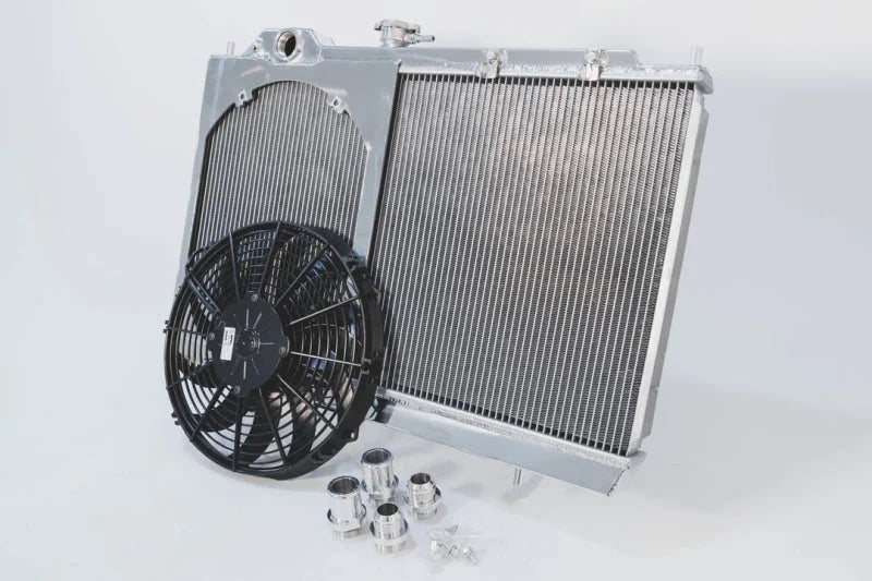 CSF 96-07 Mitsubishi Evo 4/5/6/7/8/9 Full-Slim Radiator w/12in Fan & Shroud/-16AN & Slip On Fitting - Installation View