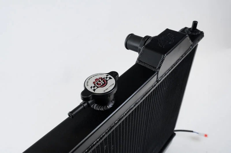 CSF 96-07 Mitsubishi Evo 4/5/6/7/8/9 Full-Slim Radiator w/12in Fan & Shroud/-16AN - Black - Side View