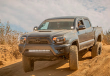 Load image into Gallery viewer, Cali Raised 05-15 Toyota Tacoma Low Prof Ditch Light Brackets Kit W/ Blue Backlight - Small