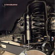 Load image into Gallery viewer, Camburg 05-24 Ford F-250/350 4WD 2.5in. Performance Coil Springs (pair) (gas) - Side View
