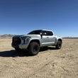 Load image into Gallery viewer, Camburg 22-25 Toyota Tundra 2WD/4WD Blue KINETIK Uniball Trail Series Long Travel Kit w/ Billet UCA - Installation View