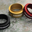 Load image into Gallery viewer, Camburg Ford Raptor 17-20 1.5in Spring Preload Spacer Kit (Red) - Installation View