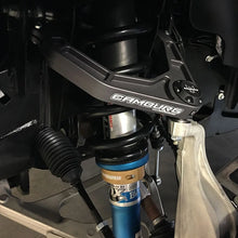 Load image into Gallery viewer, Camburg Ford Raptor 17-20 2.0in Spring Preload Spacer Kit (Gold) - Installation View