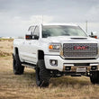Load image into Gallery viewer, Cognito 11-19 Chevy/GMC Silverado/Sierra 2500/3500 HD 2WD/4WD 4in Perf Lift Kit w/ Fox PSRR 2.0 - Side View