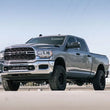 Load image into Gallery viewer, Cognito 14-24 RAM 2500 4WD 3in Performance Leveling Kit w/ Fox PS 2.0 IFP Shocks - Side View
