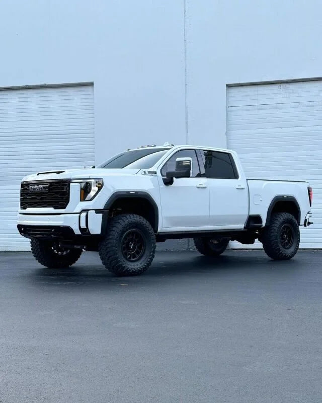 Cognito 20-24 Chevy/GMC Silv/Sierra 2500/3500 HD 2WD/4WD 4in Perf Lift Kit w/ Fox PSRR 2.0 Shocks - Side View
