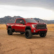 Load image into Gallery viewer, Cognito 20-24 Chevy/GMC Silv/Sierra 2500/3500 HD 2WD/4WD 4in Perf Lift Kit w/ Fox PSRR 2.0 Shocks - Installation View