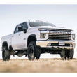 Load image into Gallery viewer, Cognito 20-24 Chevy/GMC Silverado/Sierra 2500/3500 HD 2WD/4WD 4in Std Lift Kit w/ Fox PS 2.0 IFP - Side View