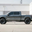 Load image into Gallery viewer, Cognito 20-24 Ford F-250/350 SD 4WD 3in Performance Lift Kit w/ Fox PS 2.0 IFP Shocks - Back View