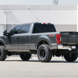Load image into Gallery viewer, Cognito 20-24 Ford F-250/350 SD 4WD 3in Performance Lift Kit w/ Fox PS 2.0 IFP Shocks - Installation View