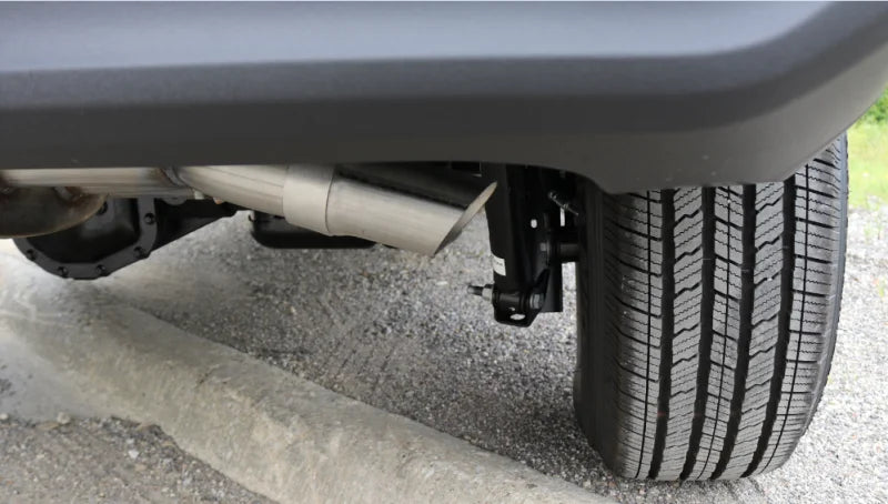 Corsa 2018-2025 Jeep Wrangler JL 2.5in Dual Rear Turn Down Exit Black Sport Axle-Back Exhaust - Side View