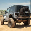 Load image into Gallery viewer, DV8 07-18 Jeep Wrangler JK Body Mounted Tire Carrier - Installation View