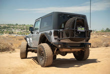Load image into Gallery viewer, DV8 07-18 Jeep Wrangler JK Body Mounted Tire Carrier - Installation View