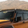 Load image into Gallery viewer, DV8 24-25 Toyota Land Cruiser / GX550 Roof Rack Light Mount (for RRTL4-01) - Installation View