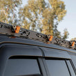 Load image into Gallery viewer, DV8 24-25 Toyota Land Cruiser / GX550 Roof Rack Light Mount (for RRTL4-01) - Additional View 6