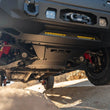Load image into Gallery viewer, DV8 24-25 Toyota Tacoma &amp; Land Cruiser Rear Belly Skid Plate - Back View