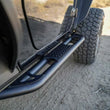 Load image into Gallery viewer, DV8 Offroad 07-18 Jeep Wrangler JK 2 Door Body/Pinch Weld Mounted Side Steps - Additional View 14