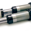 Load image into Gallery viewer, DV8 Offroad 07-18 Jeep Wrangler JK 2.0 Hydraulic 2.5in Stroke Bump Stop (Pair) - Main Product View