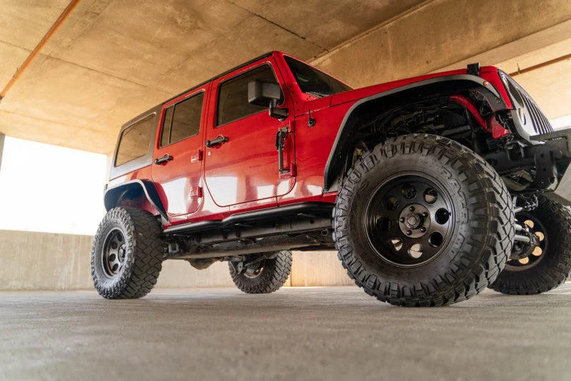 DV8 Offroad 07-18 Jeep Wrangler JK (4 Door Only) OE Plus Side Steps - Side View