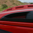 Load image into Gallery viewer, DV8 Offroad 07-18 Jeep Wrangler JK Metal Heat Dispersion Hood - Primer Black - Installation View