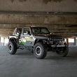 Load image into Gallery viewer, DV8 Offroad 07-23 Jeep Wrangler/Gladiator JT/JK/JL FS-25 Stubby Front Bumper w/Plated Bull Bar - Additional View 7