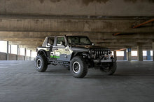 Load image into Gallery viewer, DV8 Offroad 07-23 Jeep Wrangler/Gladiator JT/JK/JL FS-25 Stubby Front Bumper w/Plated Bull Bar - Additional View 7