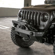 Load image into Gallery viewer, DV8 Offroad 07-23 Jeep Wrangler/Gladiator JT/JK/JL FS-25 Stubby Front Bumper w/Plated Bull Bar - Additional View 12