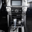 Load image into Gallery viewer, DV8 Offroad 10-23 Toyota 4Runner Center Console Molle Panels &amp; Device Mount - Back View