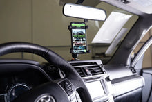 Load image into Gallery viewer, DV8 Offroad 10-23 Toyota 4Runner Digital Device Dash Mount - Additional View 13