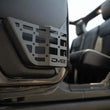 Load image into Gallery viewer, DV8 Offroad 11-18 Jeep Wrangler JK 4 Door Only Rear Door Pocket Molle Panels - Black - Additional View 9