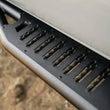 Load image into Gallery viewer, DV8 Offroad 16-23 Toyota Tacoma Crew Cab OE Plus Side Steps - Additional View 7