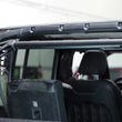 Load image into Gallery viewer, DV8 Offroad 18-23 Jeep Wrangler JL 4-Door Speaker/Light Bar Mount - Main Product View