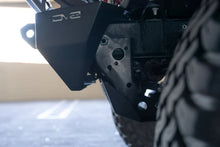 Load image into Gallery viewer, DV8 Offroad 18-23 Jeep Wrangler JL/JT Front Bumper Sway-Bar Disconnect Motor Skid Plate - Additional View 16