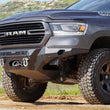 Load image into Gallery viewer, DV8 Offroad 19-23 RAM 1500 Spec Series Bumper Skid Plate - Main Product View