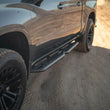 Load image into Gallery viewer, DV8 Offroad 19-24 GMC Sierra 1500 Crew Cab OE Plus Side Steps - Black Steel - Additional View 13