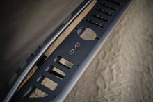 Load image into Gallery viewer, DV8 Offroad 19-24 GMC Sierra 1500 Crew Cab OE Plus Side Steps - Black Steel - Additional View 14