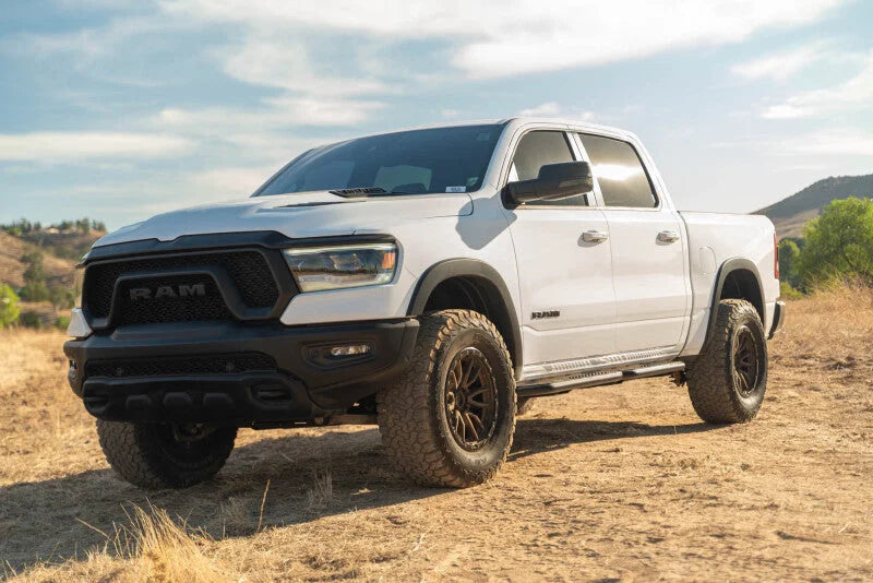 DV8 Offroad 19-25 RAM 1500 Crew Cab OE Plus Side Steps - Black Steel - Main Product View