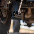 Load image into Gallery viewer, DV8 Offroad 2007-2018 Jeep Wrangler JK Rear Shock &amp; Link Skid Plates - Installation View