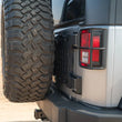 Load image into Gallery viewer, DV8 Offroad 2007-2018 Jeep Wrangler JK Tailgate Reinforcement Molle Panel - Installation View