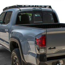 Load image into Gallery viewer, DV8 Offroad 2016+ Toyota Tacoma Aluminum Roof Rack (45in Light) - Installation View