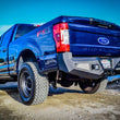Load image into Gallery viewer, DV8 Offroad 2017+ Ford F-250/350/450 Rear Bumper - Installation View