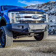 Load image into Gallery viewer, DV8 Offroad 2017+ Ford F-250/F-350/F-450 Front Bumper - Side View