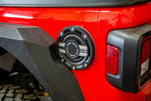 Load image into Gallery viewer, DV8 Offroad 2018+ Jeep JL Aluminum Fuel Door for 20-Pres Wrangler - Side View