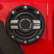 Load image into Gallery viewer, DV8 Offroad 2018+ Jeep JL Aluminum Fuel Door for 20-Pres Wrangler - Back View