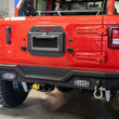 Load image into Gallery viewer, DV8 Offroad 2018+ Jeep Wrangler JL Spare Tire Delete Kit - Installation View