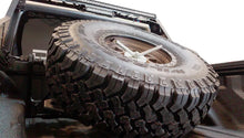 Load image into Gallery viewer, DV8 Offroad 2019+ Jeep Gladiator In-Bed Adjustable Tire Carrier - Back View